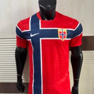 Nike Norway 2026 World Cup Home Jersey front view showing striking Chile red official Norwegian shirt with flag-inspired cross design and Nike Aero-FIT fabric texture